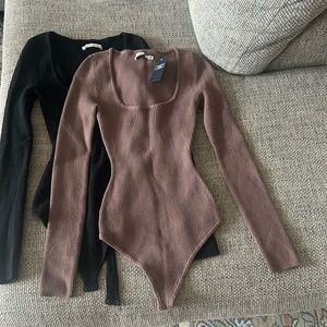 Two Abercrombie stretchy bodysuits